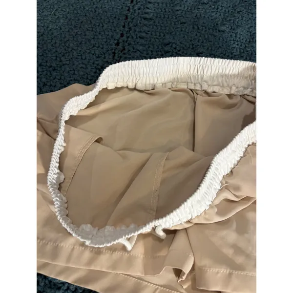 Tan Athletic Shorts with White Elastic Drawstring Waistband and Pockets - Image 3
