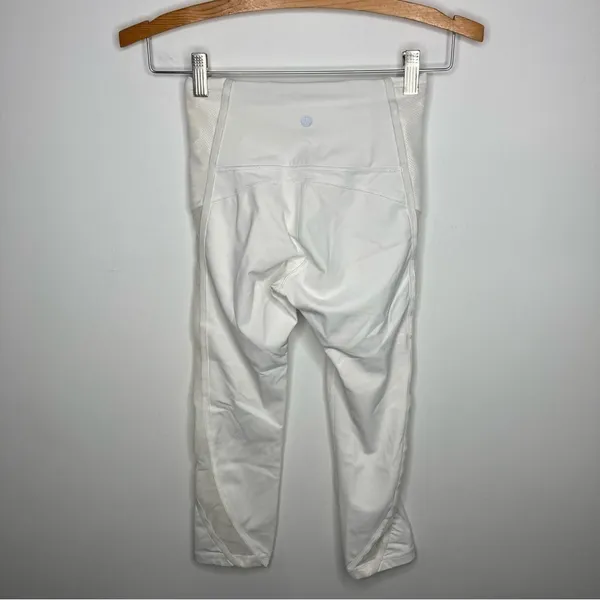Lululemon white cropped leggings with mesh sides‎ size 2 - Image 5