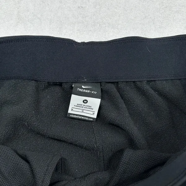 Nike Therma-FIT Women’s Sweatpants Medium Black Fleece Lined Zip Ankle Athletic - Image 4