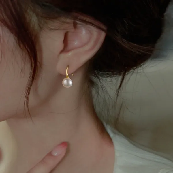 Elegant white pearl dangle drop earrings for women - Image 3