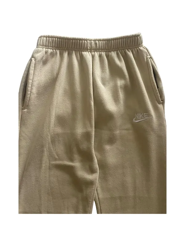 Nike-Sweatpants with Embroidered Logo-size large Soft fleece sweatpants with elastic waistband. Side pockets for storage. Embroidered Nike logo on leg. Neutral cream tone easy to match, 100% polyester, excellent condition Measurements: Waist: side to side 16-20 inches Rise: 12 inches Inseam: 30 inches - Image 4