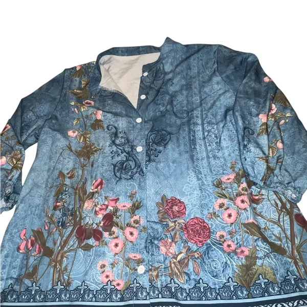 Blue faded look top with floral design. - Image 7