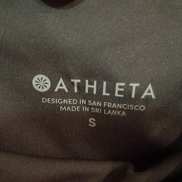 Athleta Ace Black Tennis Skort with silver reflective stripe on waistband - Image 8
