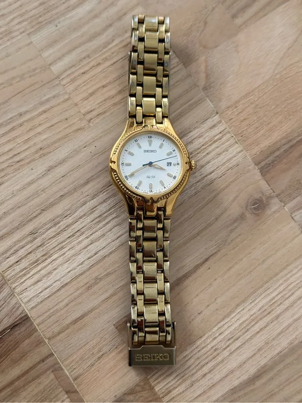 Seiko Vintage Watch Gold Bracelet Case White Dial Blue Gold Hands Date Window - Image 5