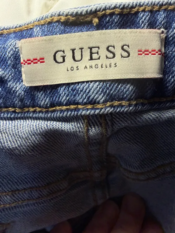 Guess Y2K asymmetrical jean mini skirt raw hem size large. - Image 4