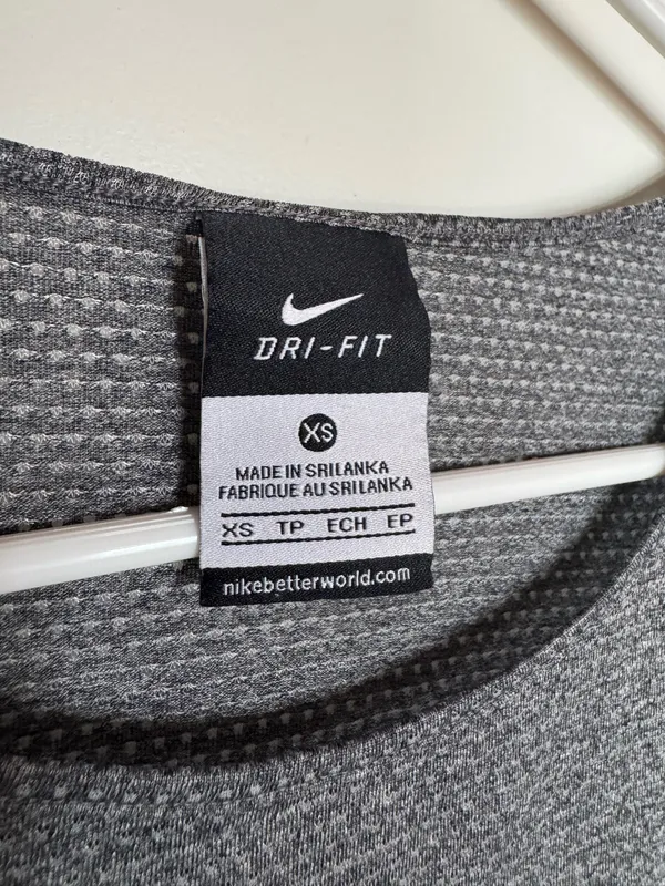 Nike Dri Fit Crop Top with Zipper Side Pocket - Image 9