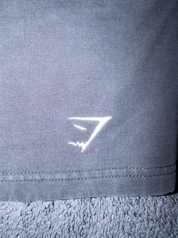 Gymshark Black Tapered Track Joggers with Side Logo - Image 6