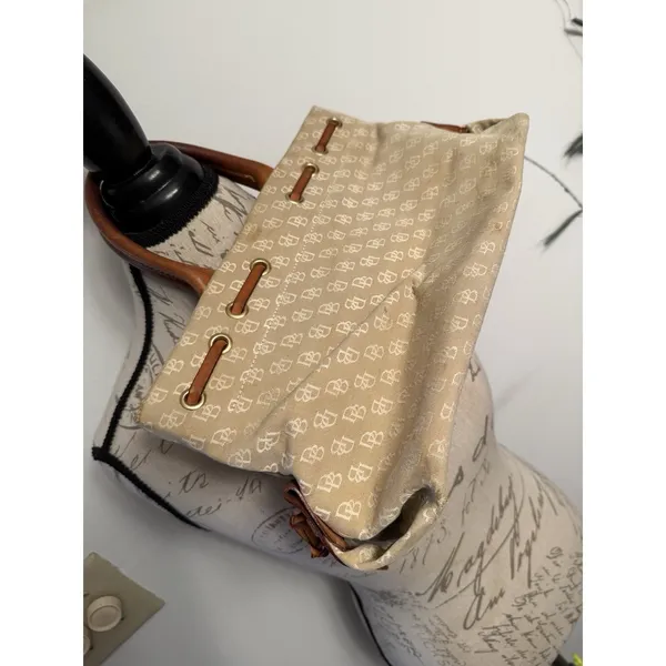 Dooney and Bourke Beige Canvas and Leather Signature Tassel Tote Handbag‎ - Image 3