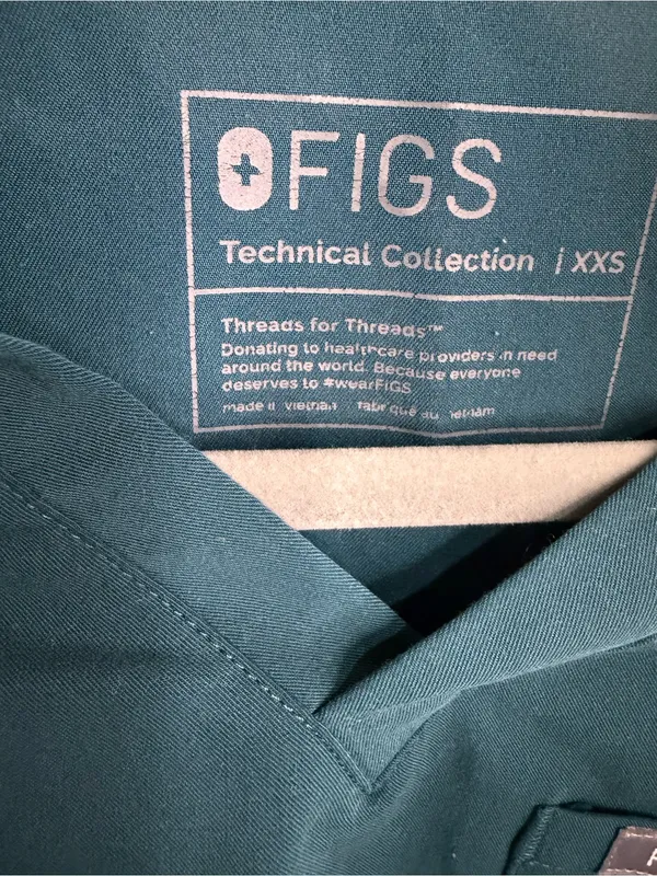 Figs Women’s Teal V-Neck Scrub Top with Navy Pants - Image 4
