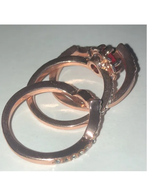 Elegant Rose Gold Tone Red Gemstone Ring Stack with Crystal Accents - Image 4