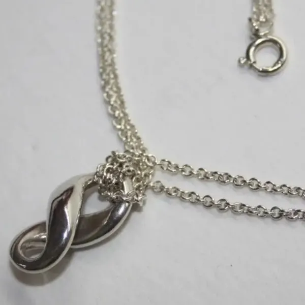 Tiffany & Co. Sterling Silver figure 8 infinity necklace - Image 4