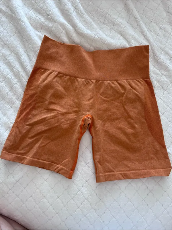 NVGTN High-Waist Rust Orange Bike Shorts - Image 2