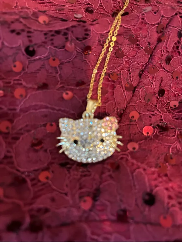 Hello Kitty Gold-tone Crystal Face Pendant with Pink Accents - Image 2