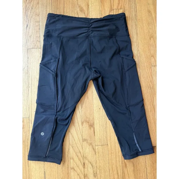 Lululemon Pants 10 black crop‎ leggings Reflective mesh back panel Athletic - Image 2