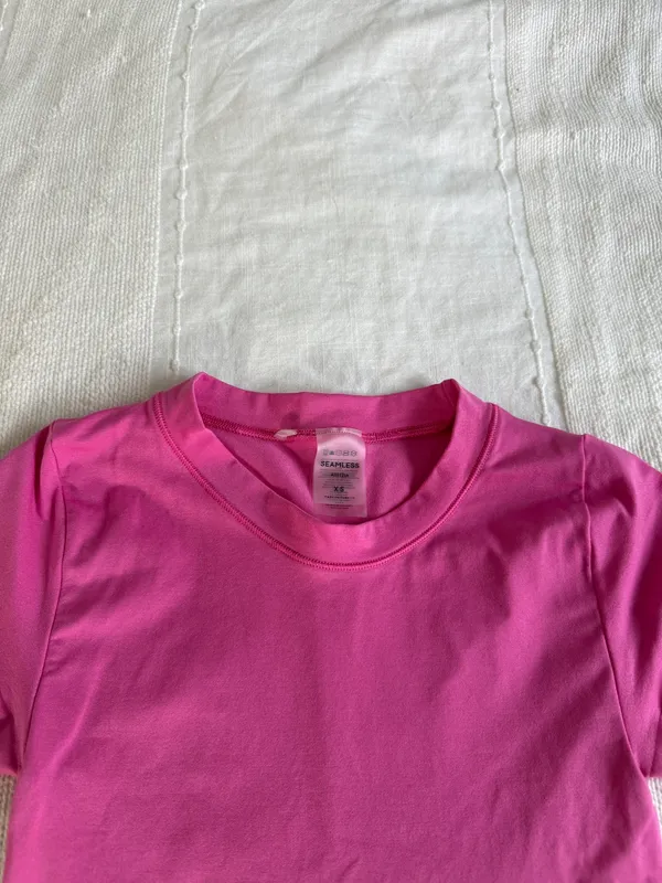 Aritzia “Seamless tee” in a vibrant pink color - Image 2