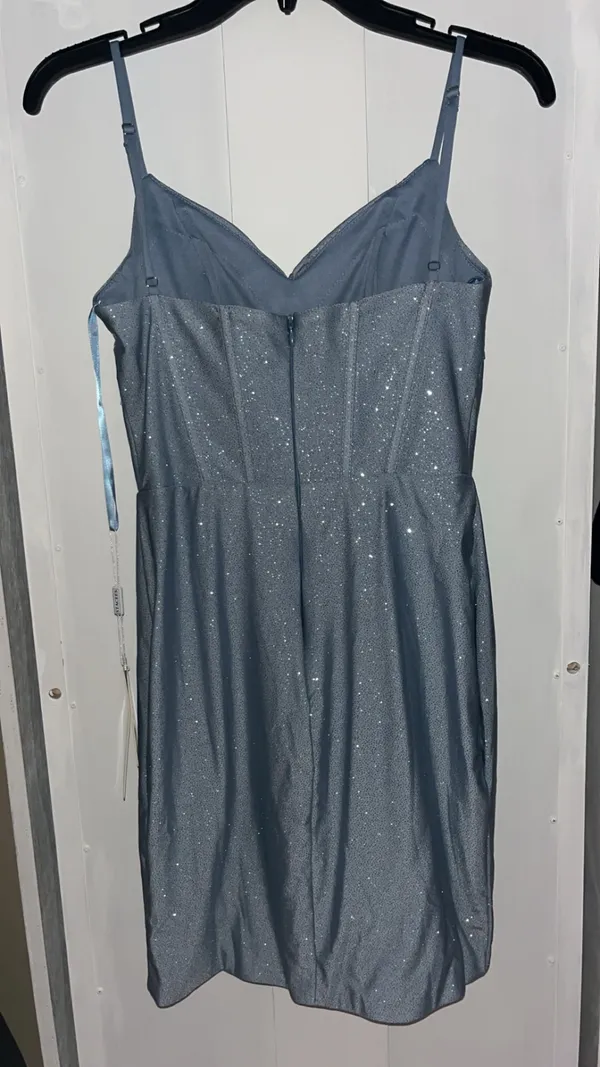 Stacees dusty blue, glittery, mid-length dress, with corset rib design, and knot design on chest, with bra padding built in. - Image 7