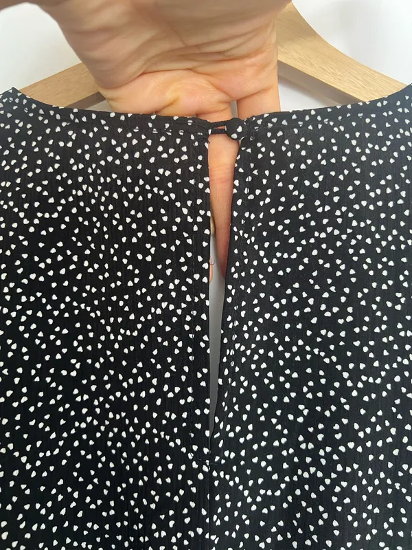 Luxxel Black and White Polka Dot Long-Sleeve Fit-and-Flare Romper - Image 5