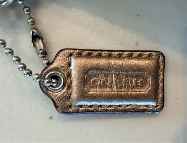 Coach | Gold Signature C Wristlet Bag. - Image 5