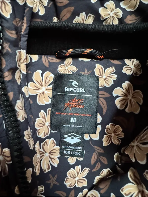 Rip Curl Black Puffer Jacket with Cream Floral Print - Image 8