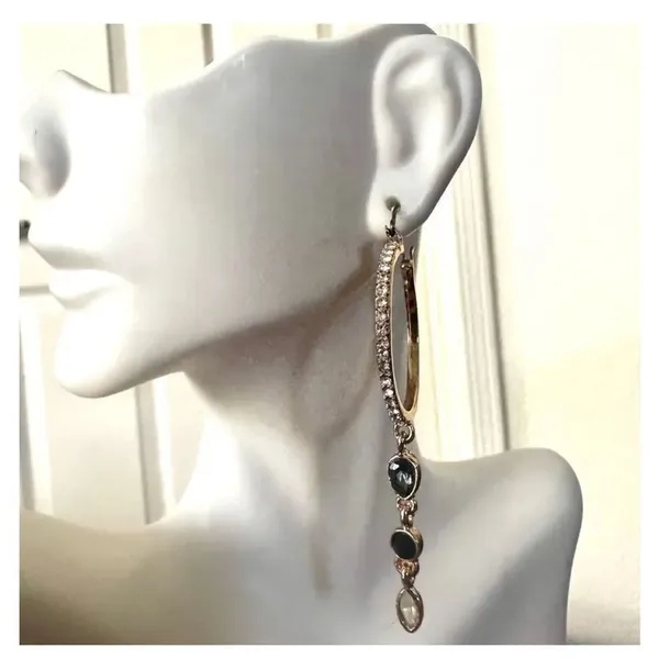 Gold tone hoop earrings with dangling rhinestones - Image 2