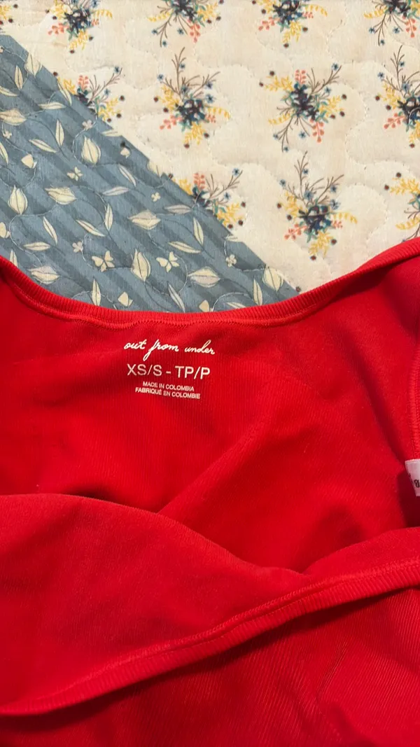 Out from under red tank top  - Image 3