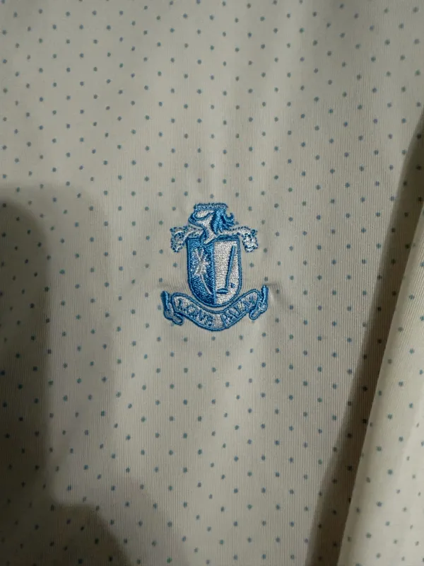 FootJoy Men’s White Polo with Light Blue Dots & Crest - Image 3
