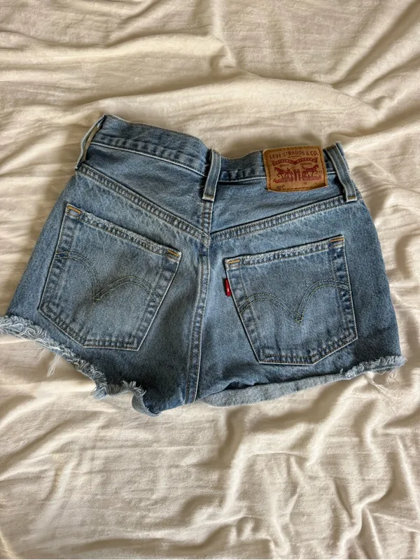 Levi's Distressed Light Blue Denim Cutoff Shorts - Image 2