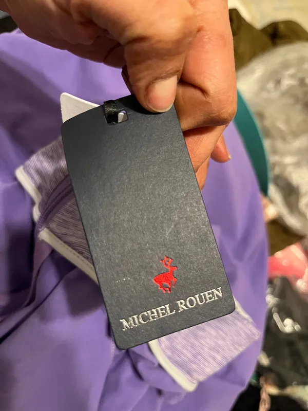 Michel Rouen Stay stylish on the course with this sleek purple golf vest. Perfect for layering, it offers comfort and flexibility for every swing. - Image 11
