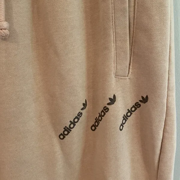 Adidas Originals 'Logomania' triple logo joggers in blush - Image 7