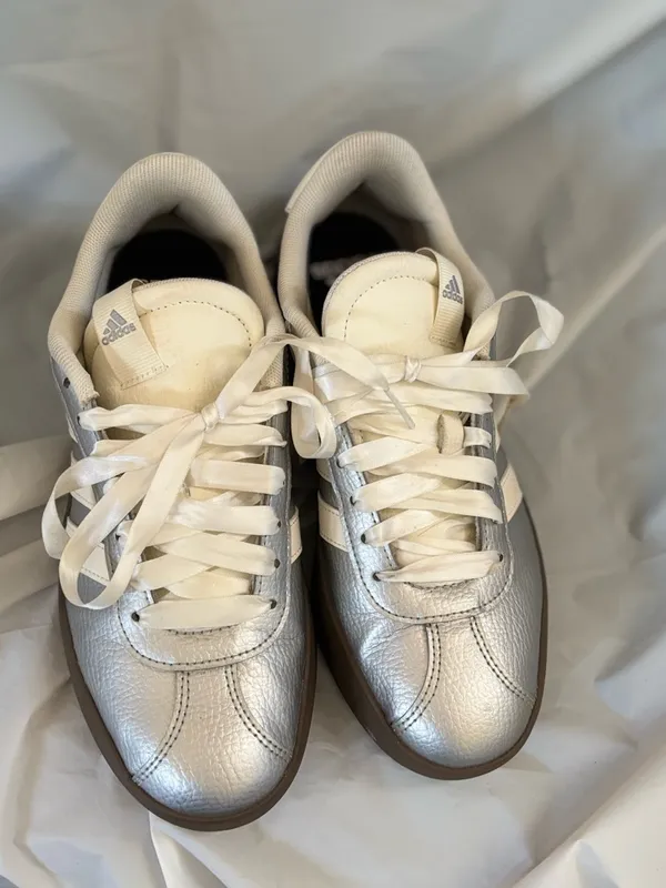 adidas Women’s Silver Metallic Sneakers with White Stripes and Brown Gummy Sole - Image 3