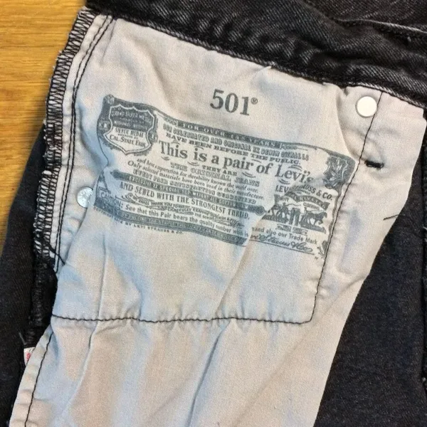 Levi’s 501 raw hem black button fly shorts 27 - Image 7