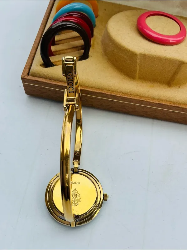 Gucci Gold Bangle Watch with beautiful bezels💛💙💚❤️💜🩵 - Image 6