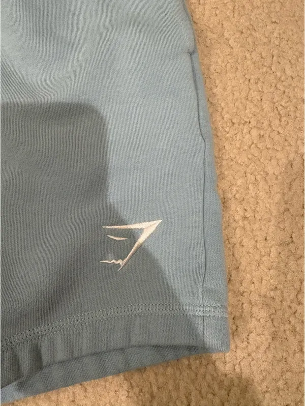 Gymshark M Iceberg Blue Crest 7” Shorts - Image 3