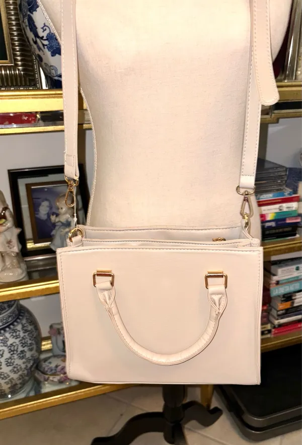 Bebe Aerin Blush Quilted Satchel bag in light pink (blush) with V-capped design and a distinctive gilded logo decorative padlock. - Image 4