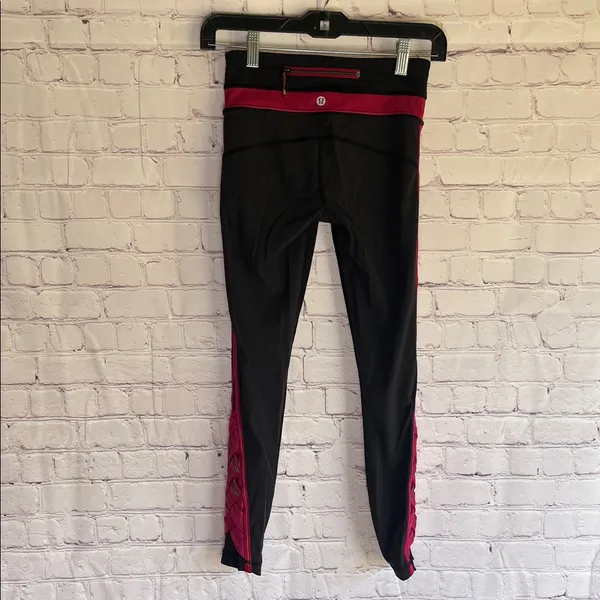 Lululemon Athletica Black and‎ Pink leggings Woman’s Size 2 - Image 2