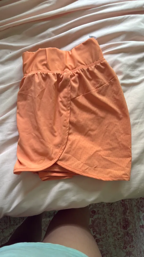 ASICS Women’s Athletic Shorts running orange medium - Image 2