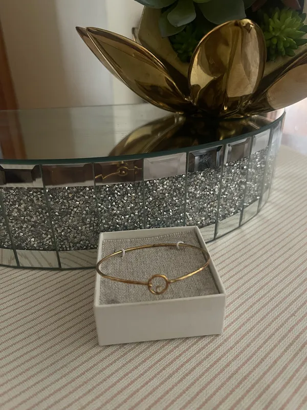 This is a Pura Vida bracelet featuring a dainty gold-tone wave charm - Image 9