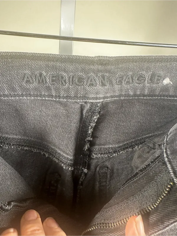 J135. American Eagle women’s distressed black/washed-gray jeans - Image 3