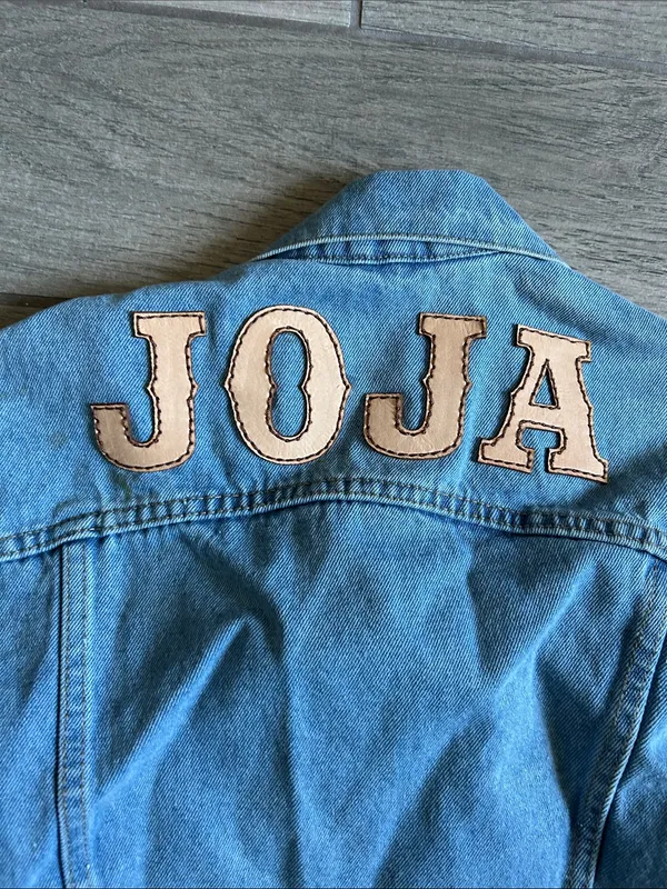 Understated Leather Light Blue Women's Denim Jacket - Classic Trucker Style - Image 5
