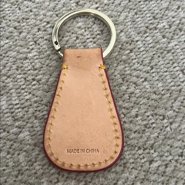 Dooney & Bourke Beige Leather Key Holder with Gold Ring - Image 2