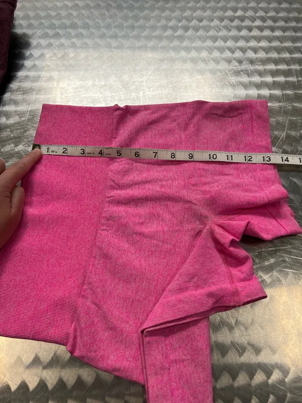 Comfortable high-waist seamless shorts in vibrant pink. Soft, stretchy fabric for unrestricted movement. Smooth waistband provides a flattering, secure fit. Ideal for workouts, yoga, or everyday wear. Size small - Image 4