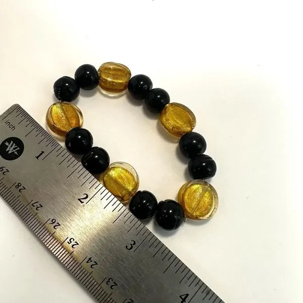 Black and yellow stretchy beaded bracelet - Image 4