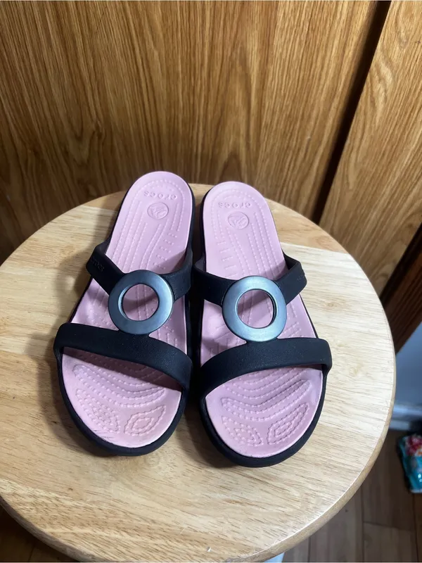 CROCS Women’s Black Slide Sandals with Pink Footbed and Metallic Ring - Image 2