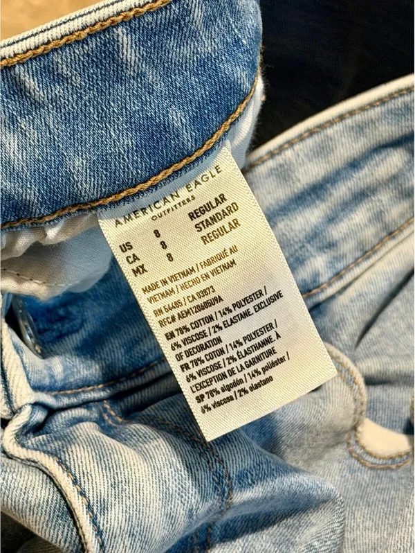 American Eagle Next Level Stretch Light Wash Distressed Flare Jeans - Image 9