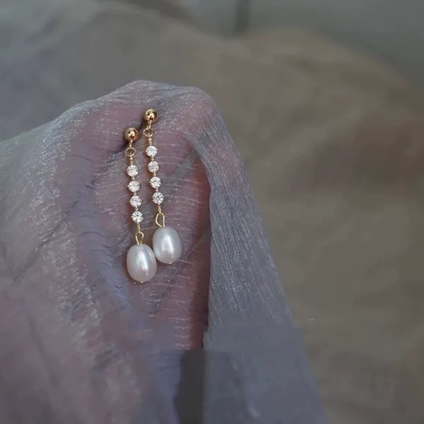 Elegant white pearl dangle drop earrings for women - Image 4