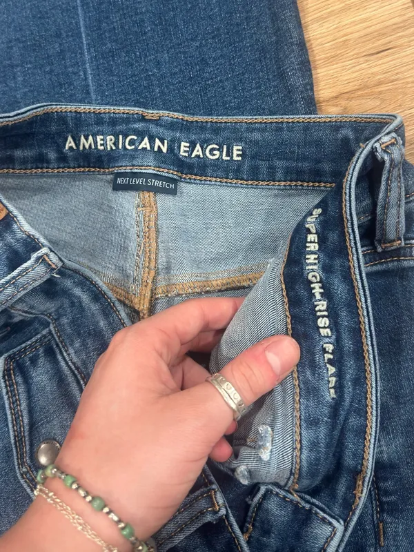 AMERICAN EAGLE Western Stretchy High-rise Bareback Raw Hem Flare Jeans | Size 6 - Image 2