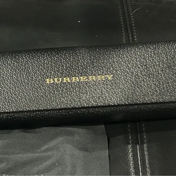 Burberry Black Case with Gold Logo includes Burberry cleaning cloth. - Image 5