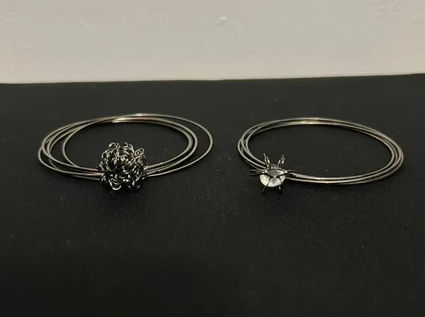 2 Black Metal Bracelet Bangles with charms - Image 2
