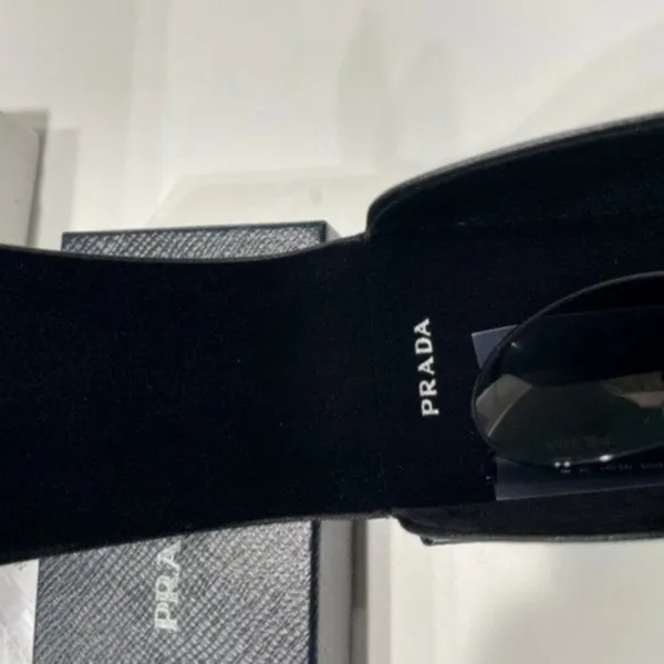 Prada 61mm Oval Sunglasses silver - Image 11