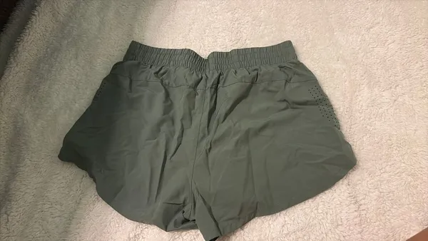 ASICS green shorts - Image 2